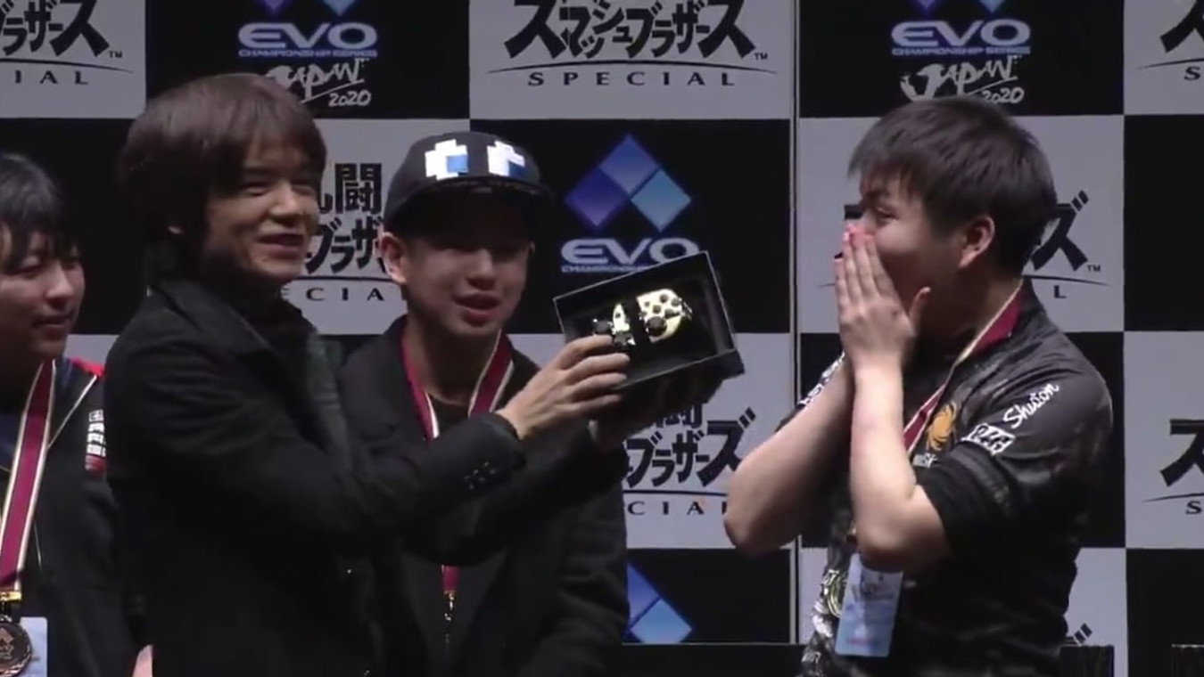 Smash Ultimate’s Sakurai presents EVO Japan winner with Pro Controller - gets dropped instantly