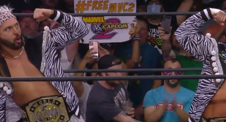 #FreeMvC2 sign spotted at All Elite Wrestling event
