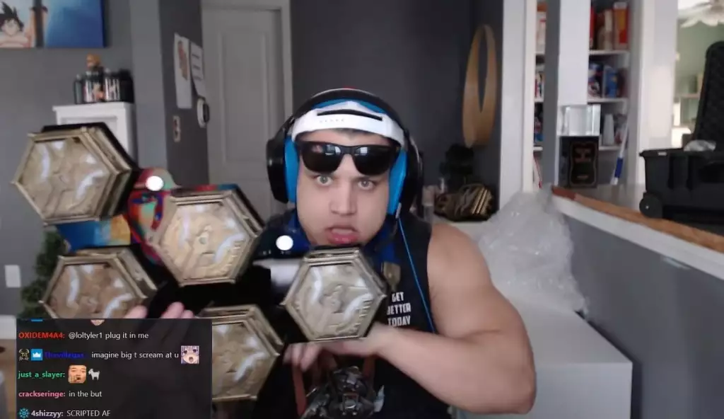 Tyler1 shows off his custom medallions for reaching Challenger in all five roles of League of Legends.